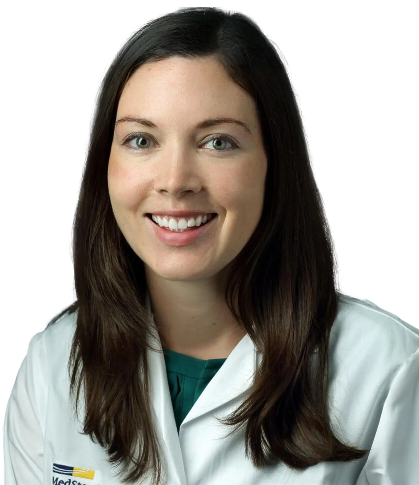 A woman with long dark brown hair wearing a white medical coat over a green top, smiling against a white background.