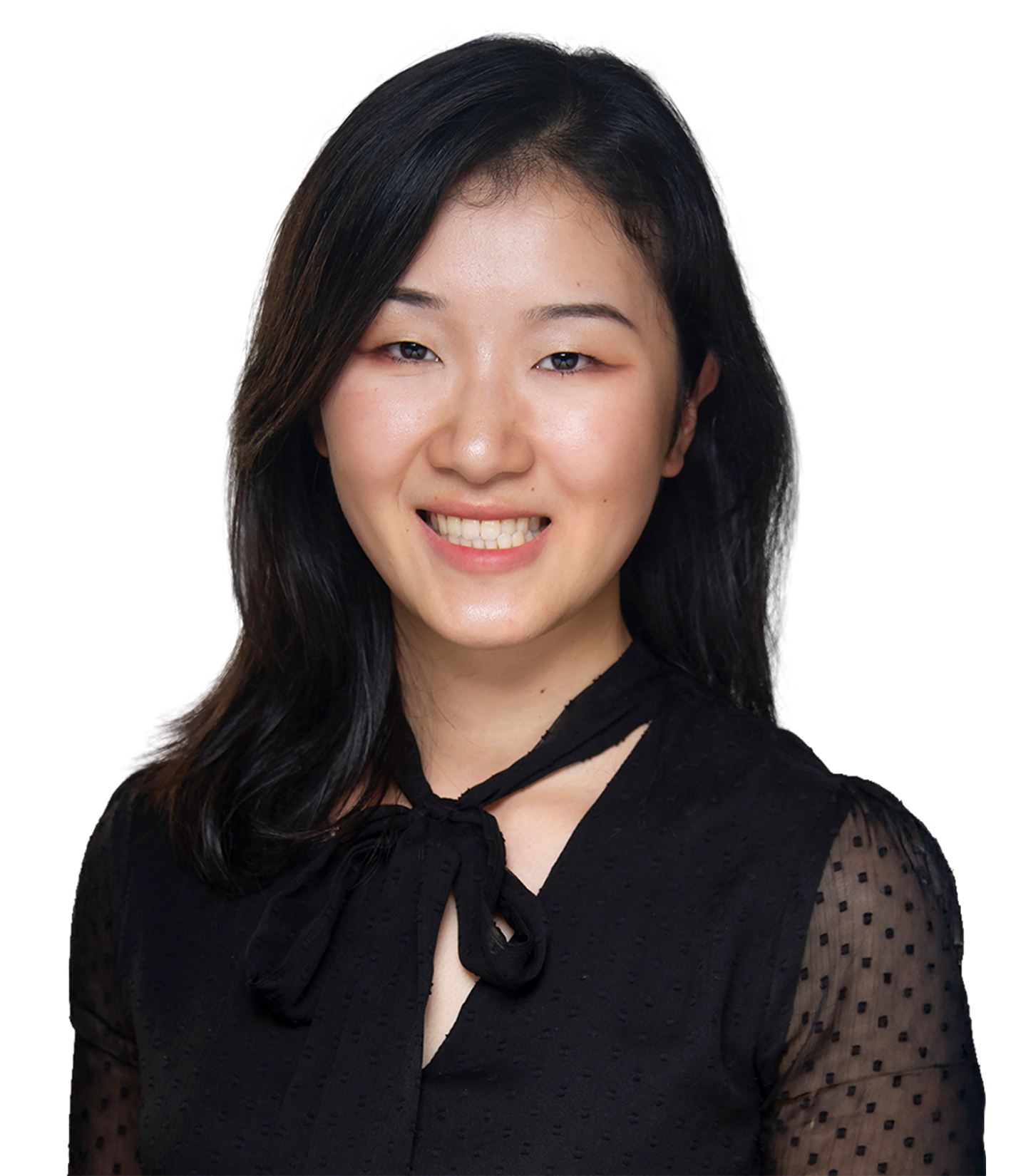 A woman with shoulder-length dark hair wearing a black blouse with a tie detail at the collar, smiling against a white background.