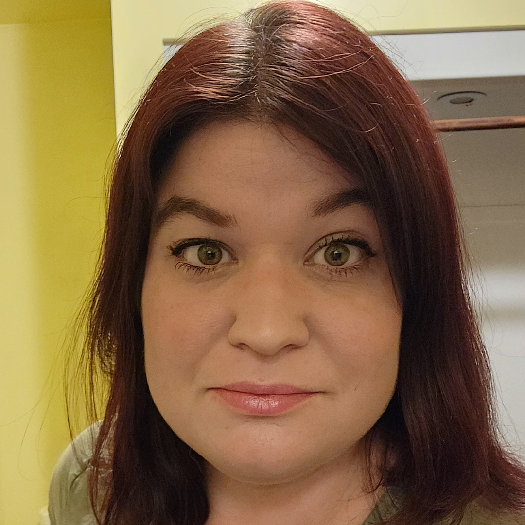 Megan pictured smiling at the camera