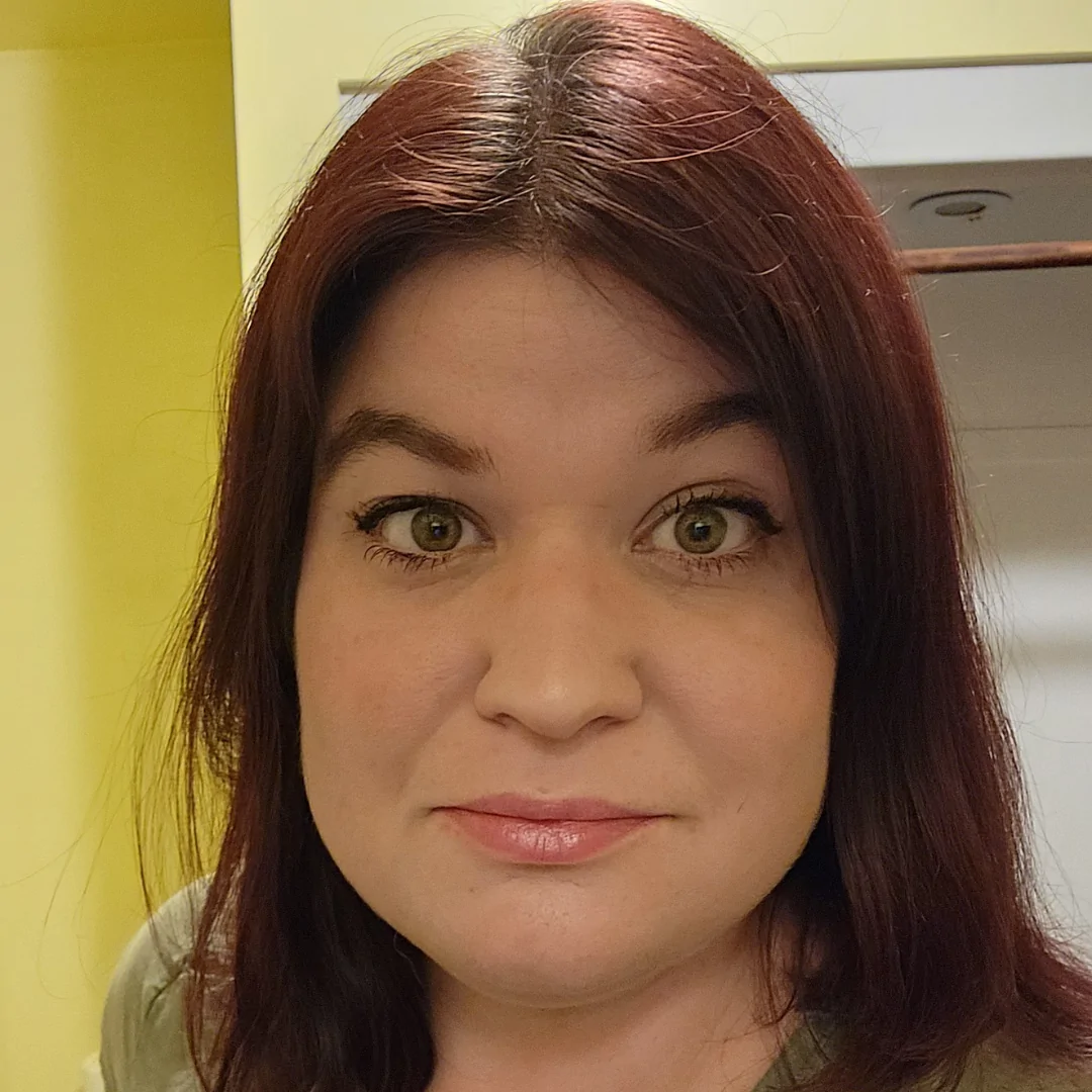 Megan pictured smiling at the camera