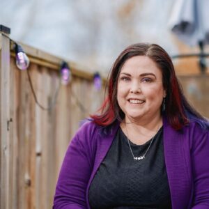 Christine MacFayden smiling outside.