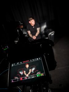 Wayne filming short clips for social media about vasculitis