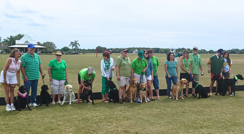 Janet pictured with family and friends at a dog park