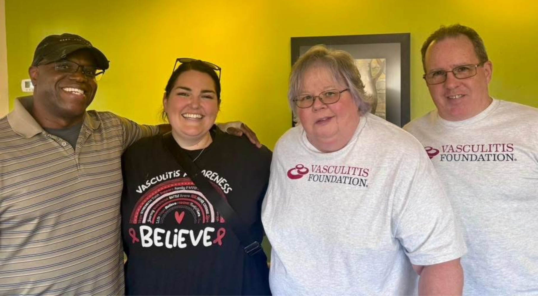 Megan with family and friends wearing Vasculitis Foundation t-shirts