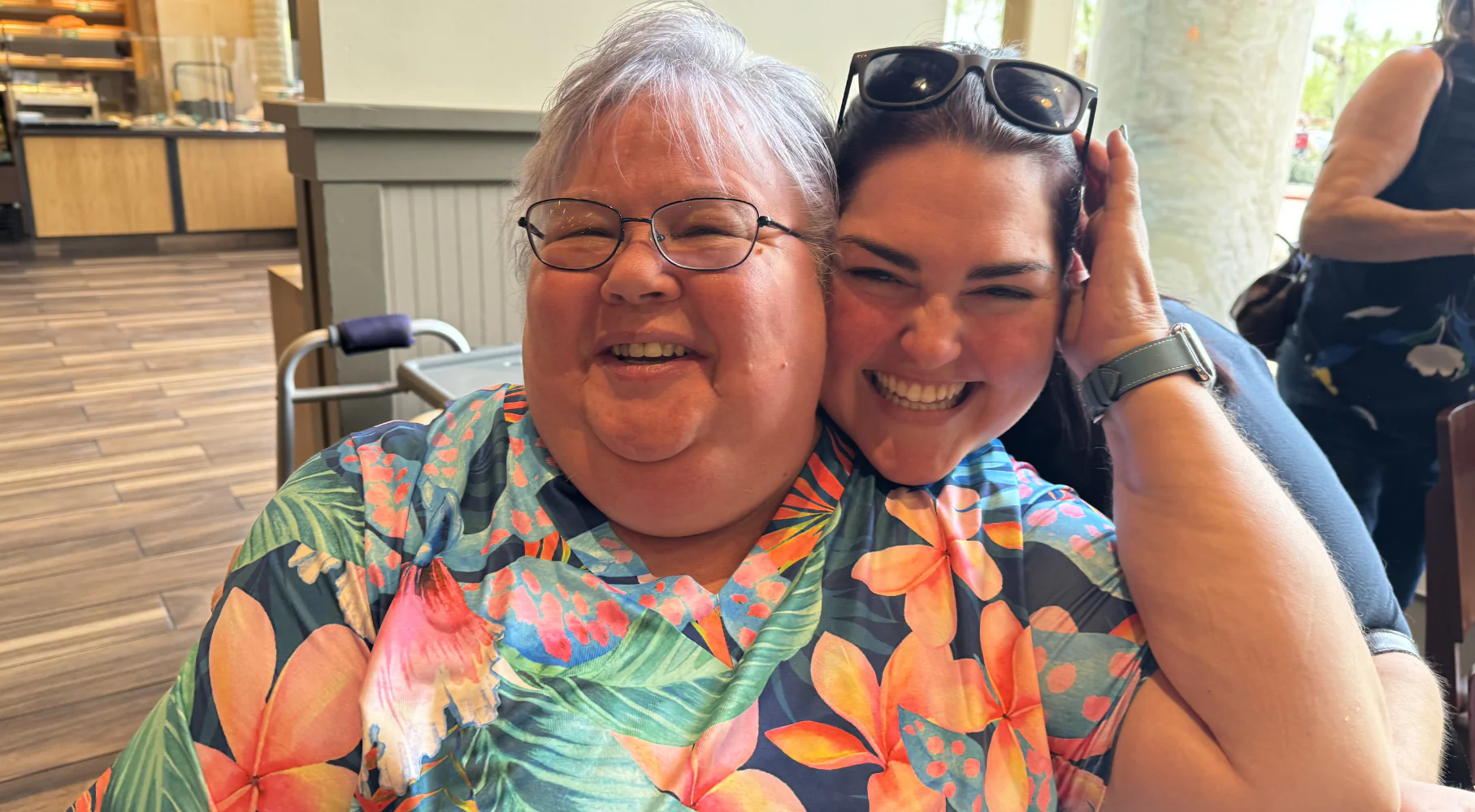 Megan pictured smiling with family