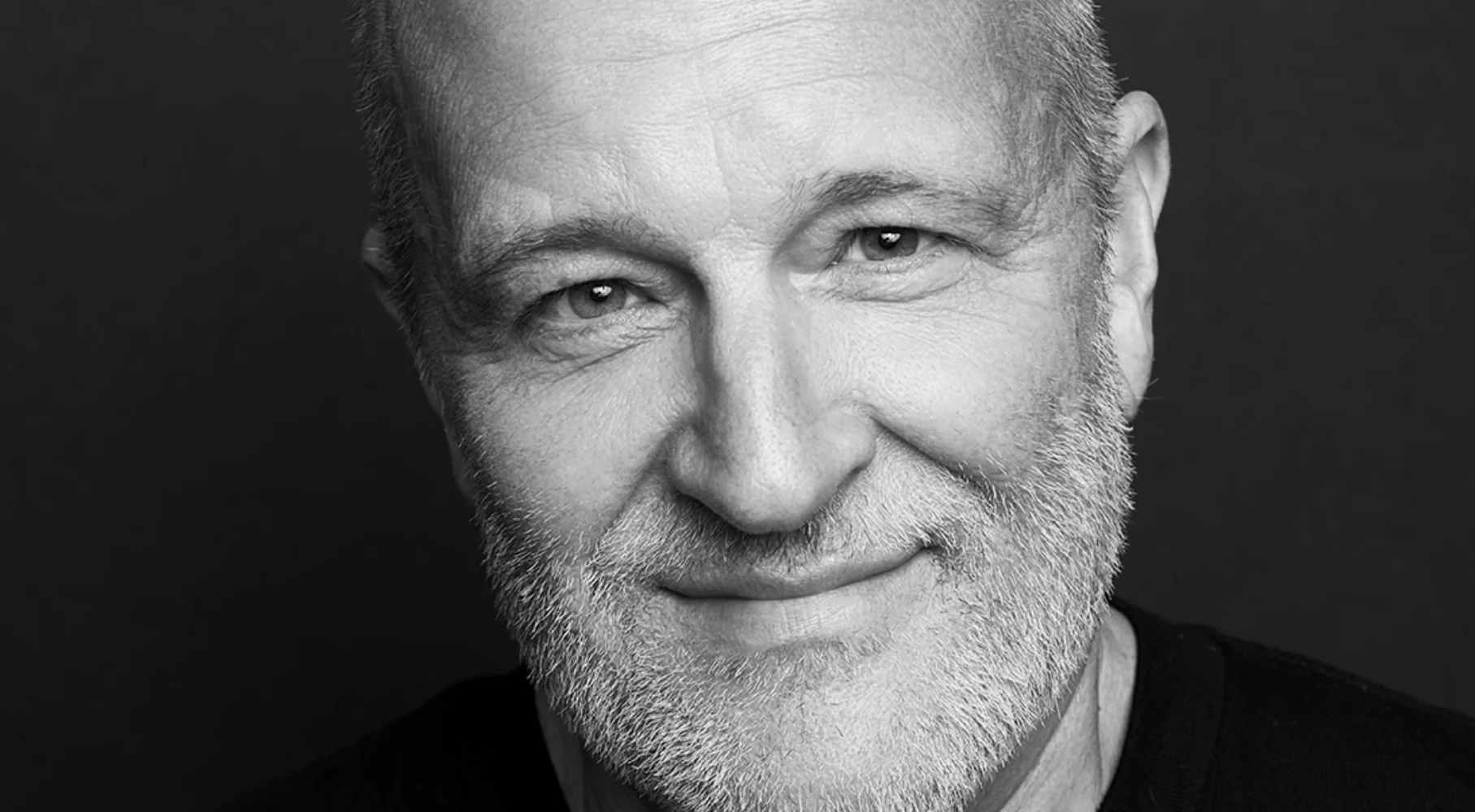 Black and white headshot of Gary