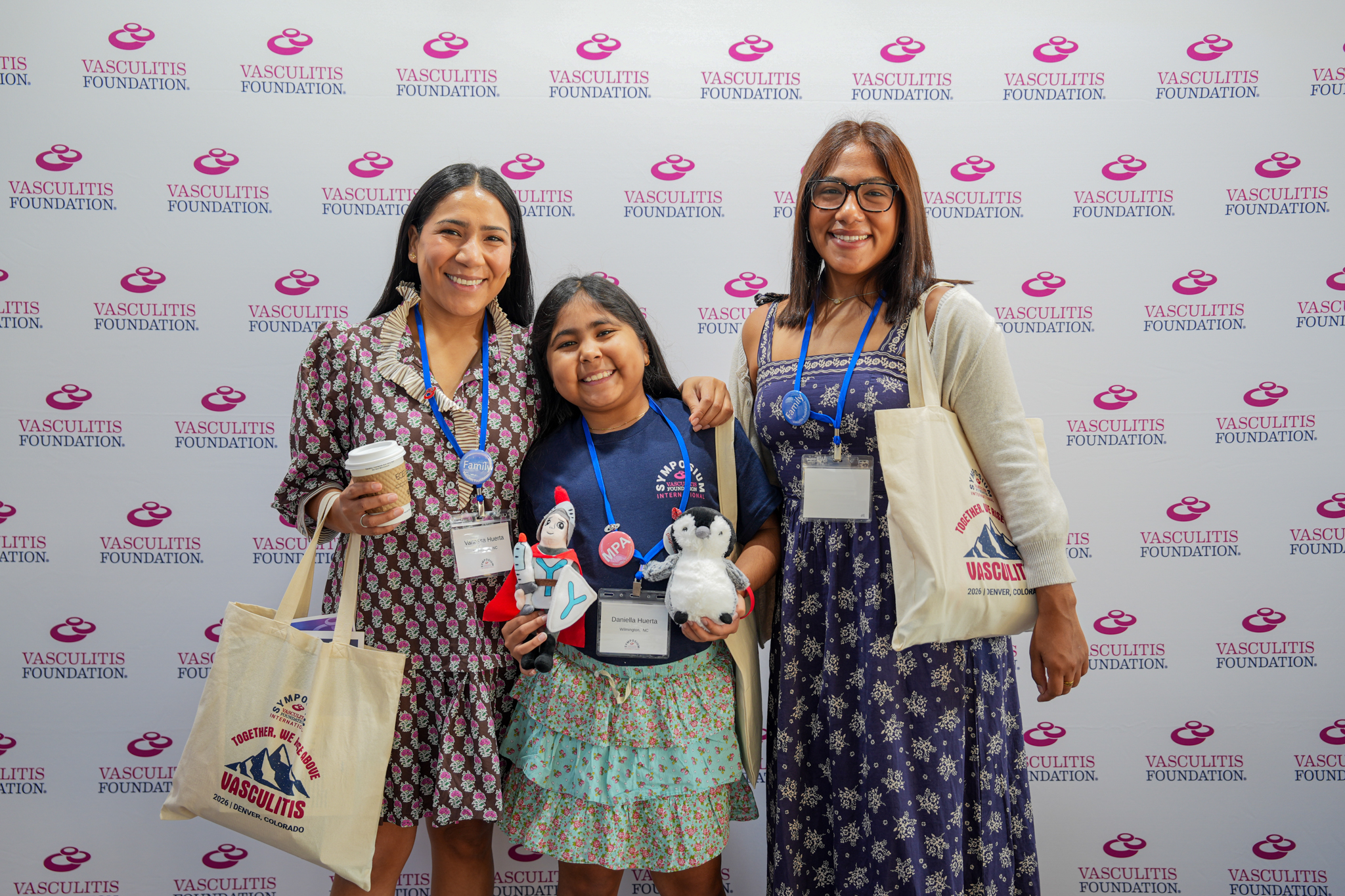 Photo of family with young girl at a Vasculitis Foundation event