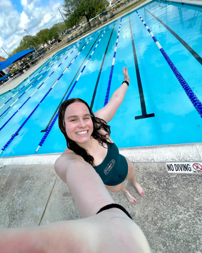 Caitlyn pictured at a swim meet